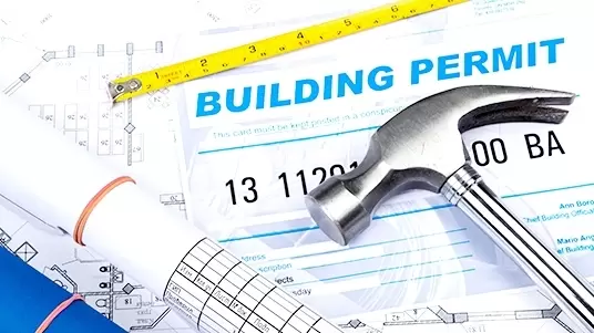 Research building permits and code requirements